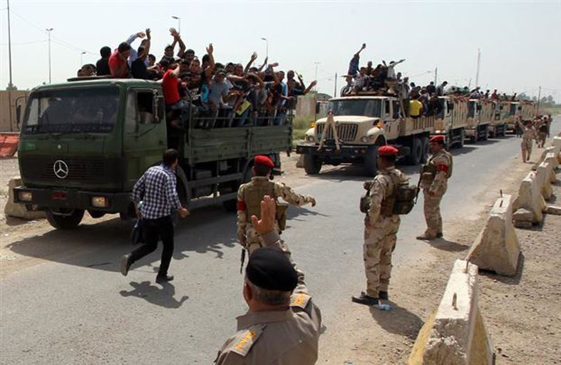 القوات الإسبانية تسلم معسكر بسماية للقوات العراقية