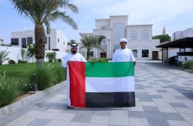 بلدية العين تطلق حملة للحفاظ على العلم