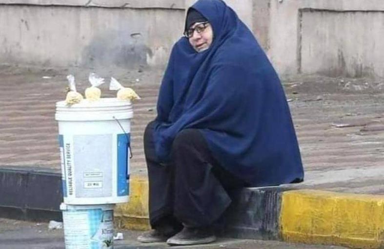 سيدة المطر.. قصة صورة شغلت المصريين
