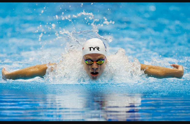 مارشان يحطم رقم فيلبس في 400 متر سباحة