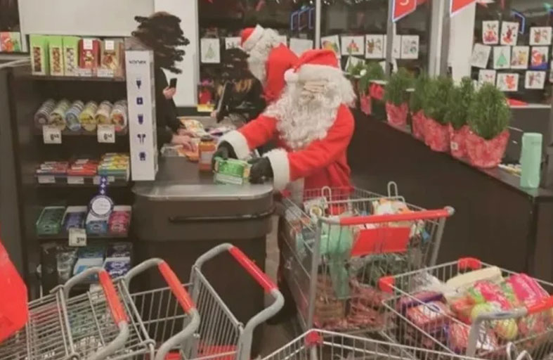 لصوص يسرقون متجراً بزي بابا نويل
