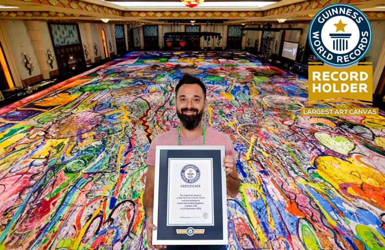 «رحلة الإنسانية» أكبر لوحة فنية على القماش في العالم.. إبداع فريد وجد طريقه من دبي إلى موسوعة غينيس للأرقام القياسية