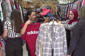 فلسطينيات برام الله يعدن تدوير الملابس لأغراض خيرية 