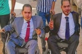 توأم مصري يتحدى الإعاقة