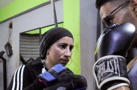 مصرية تدرب الرجال على الملاكمة