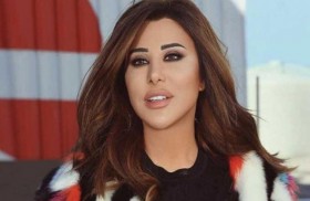 نجوى كرم تُعزي جوليا وزياد بطرس 