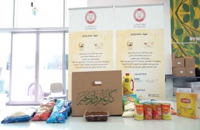 شرطة أبوظبي و أبشر ياوطن توزعان المير الرمضاني