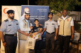 شرطة أبوظبي والهلال الأحمر تسعدان الأيتام في يوم زايد للعمل الإنساني