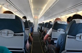 شركة طيران تخصص مقاعد لرافضي الكمامات